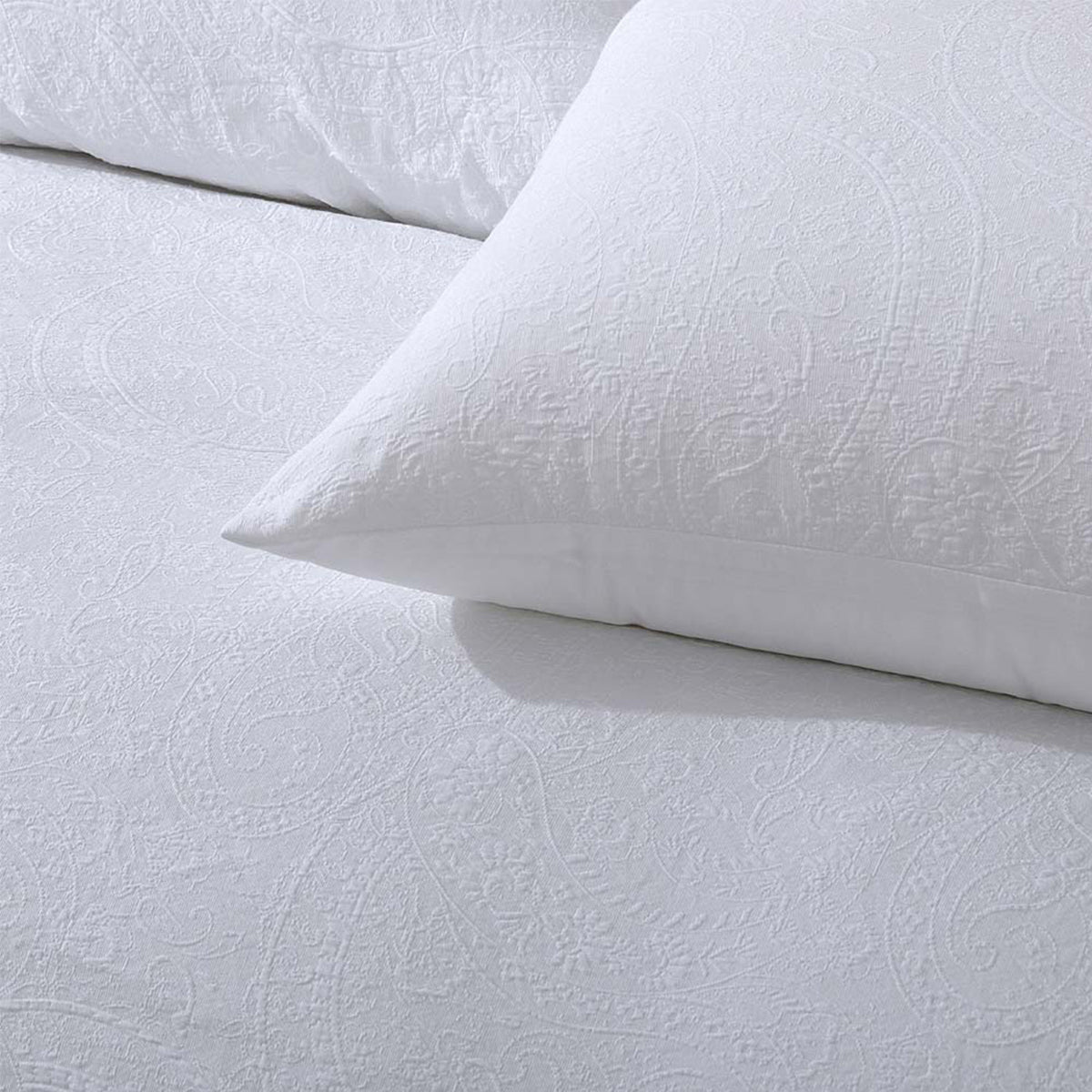 Estelle White Jacquard Design Queen Quilt Cover Set highlighting its elegant texture.