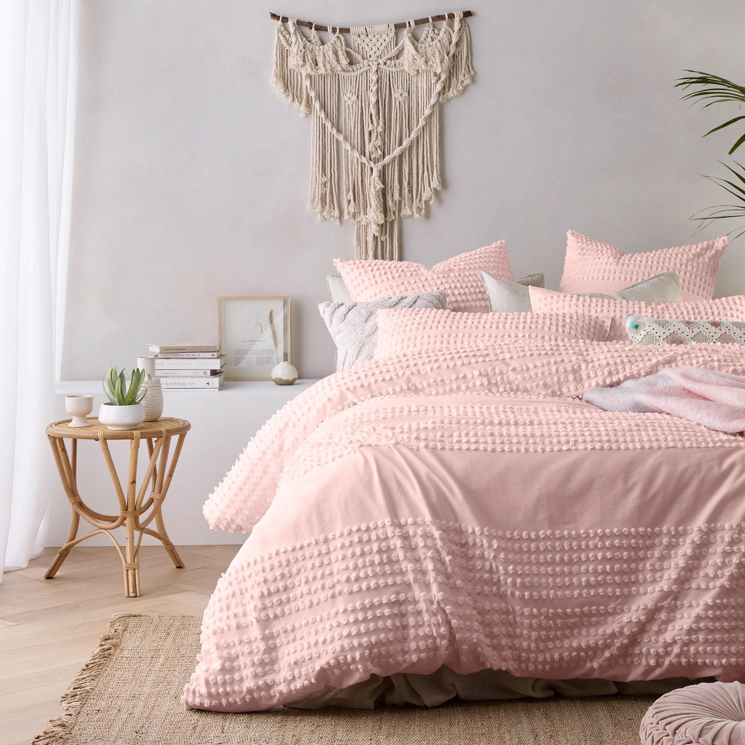 Elegant Betty Blush Single Quilt Cover Set in a cozy bedroom setting.