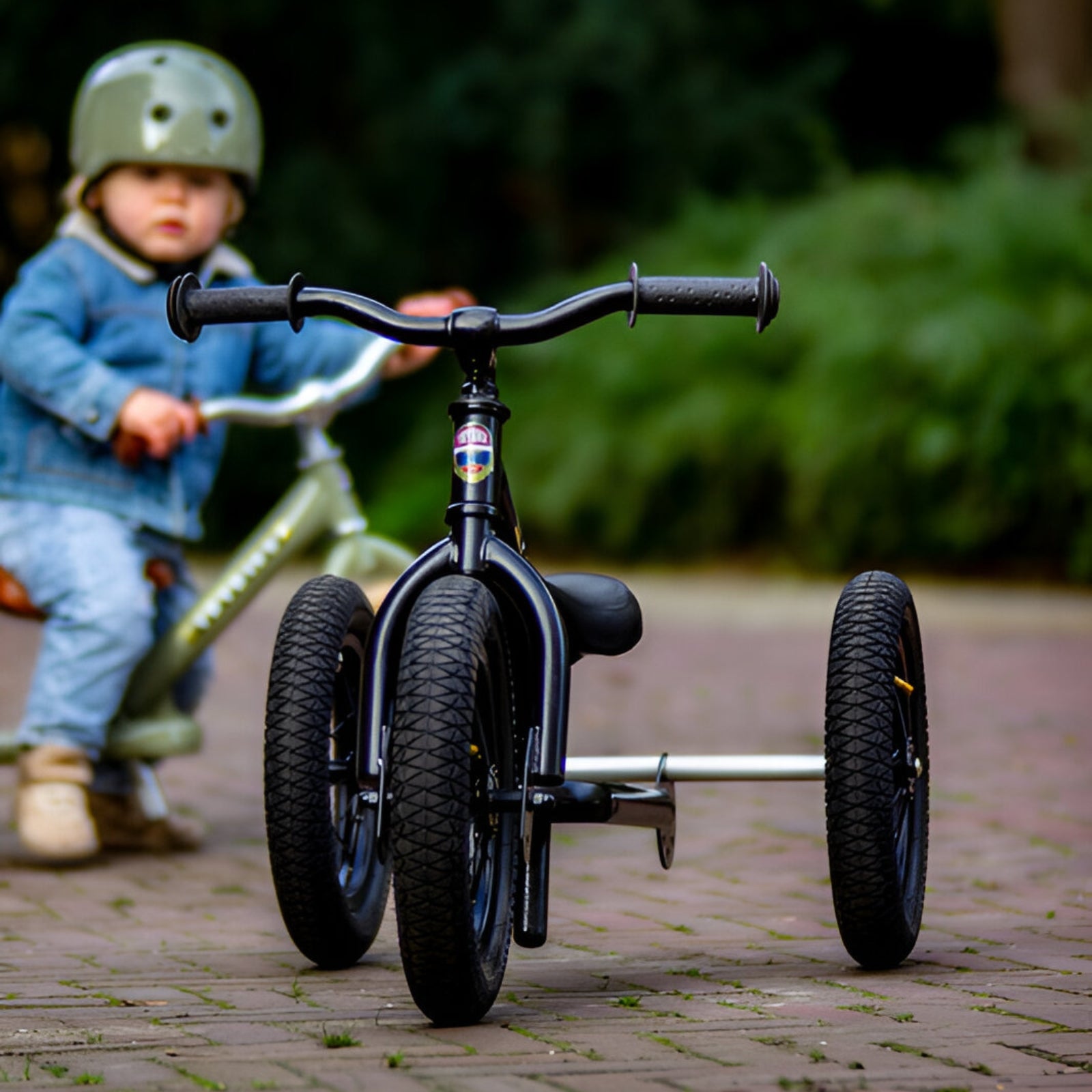 Urban adventure awaits with the Trybike Black for kids.