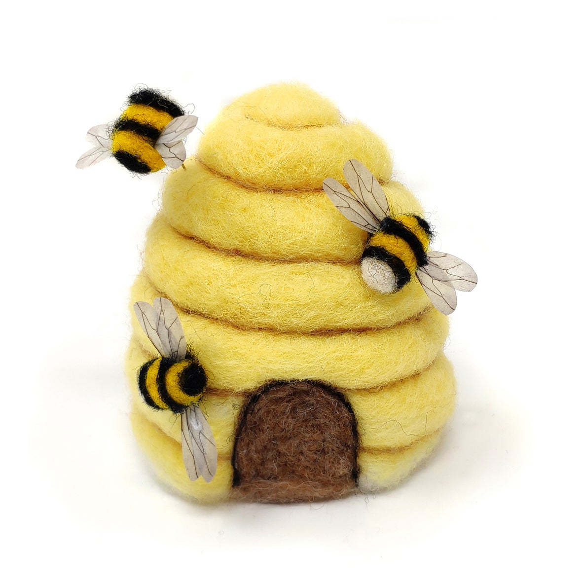 needle felt beehive craft kit image of completed beehive and honey bees